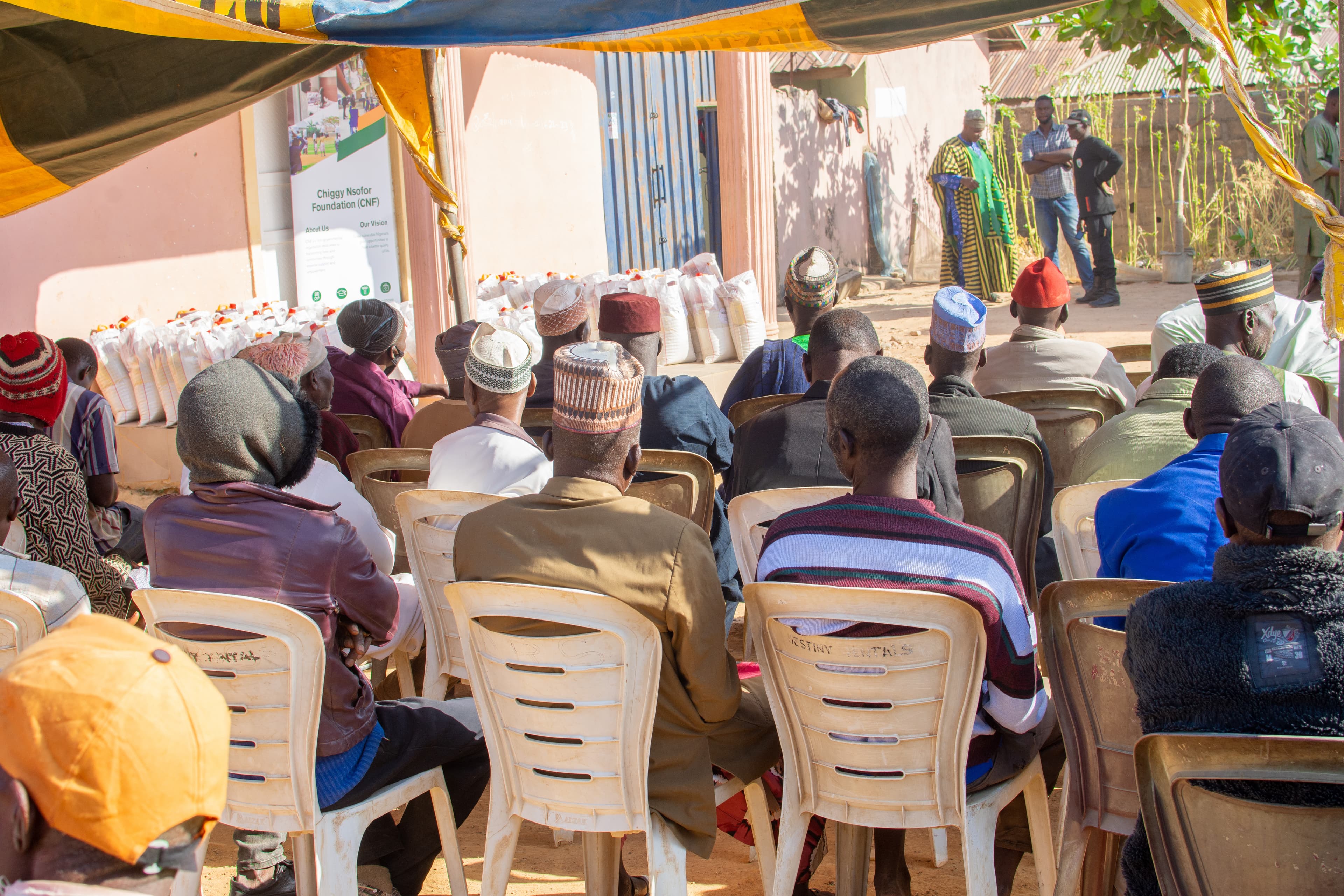 CNF Festive Food Relief outreach with community members and relief supplies in Gonin Gora